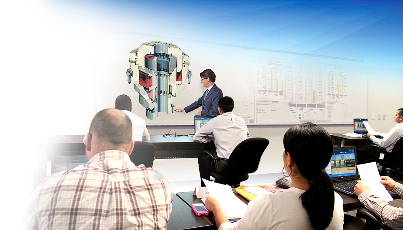 A group of co-workers in a well control classroom at their office